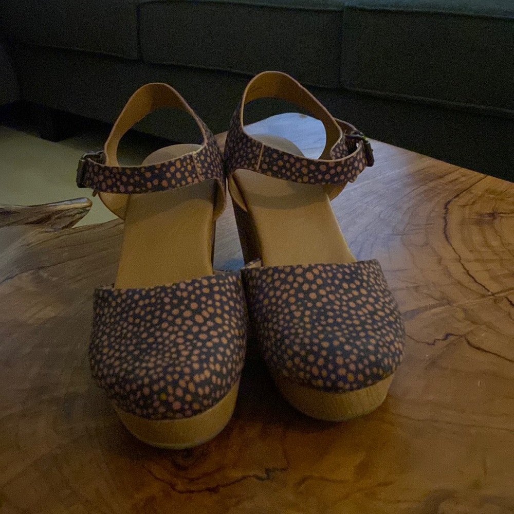 Black and tan platform clogs